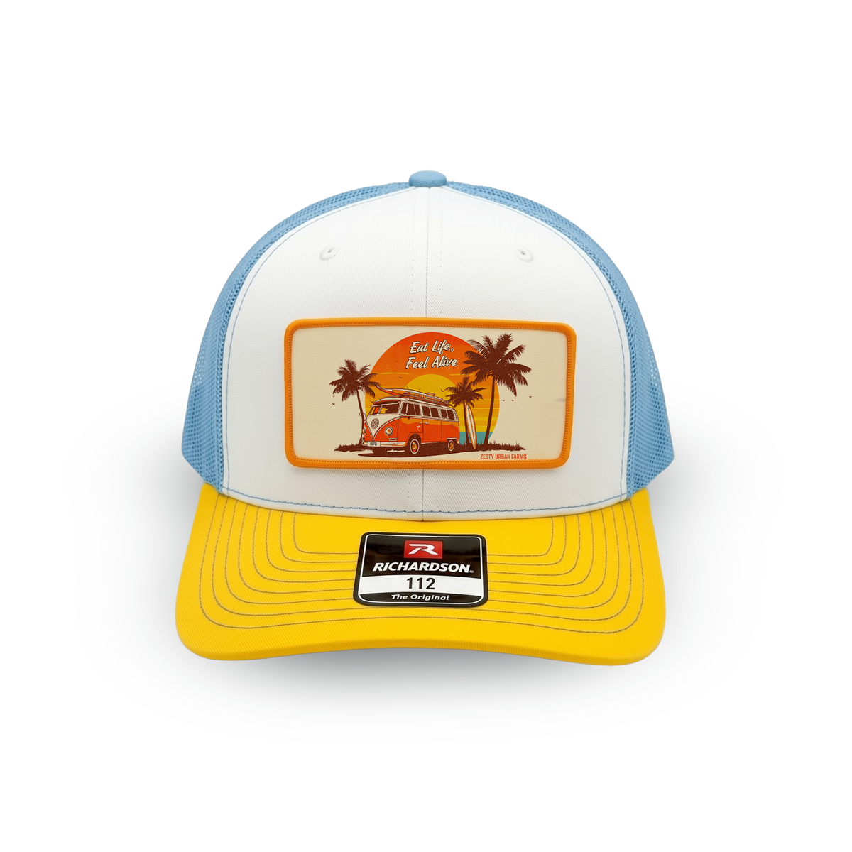 Yellow, white, and blue trucker hat with a 'Richardson 112' bill patch and an 'Eat Life, Feel Alive' beach van patch on the front.